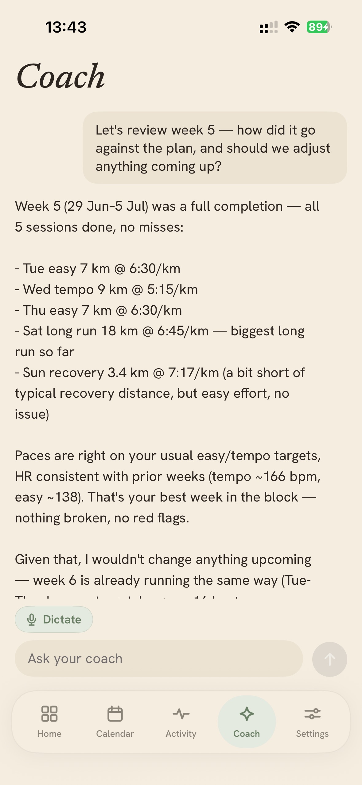 The coach reviewing the week session by session — real paces and heart rate, what worked, what to adjust — with a Dictate button.