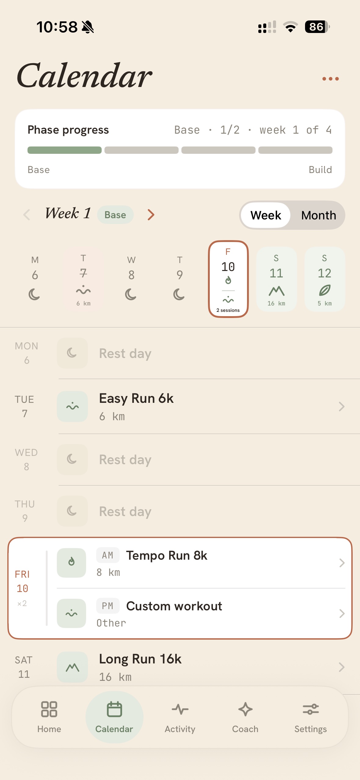 A calendar day with two sessions stacked: an AM tempo run and a PM session, marked ×2.